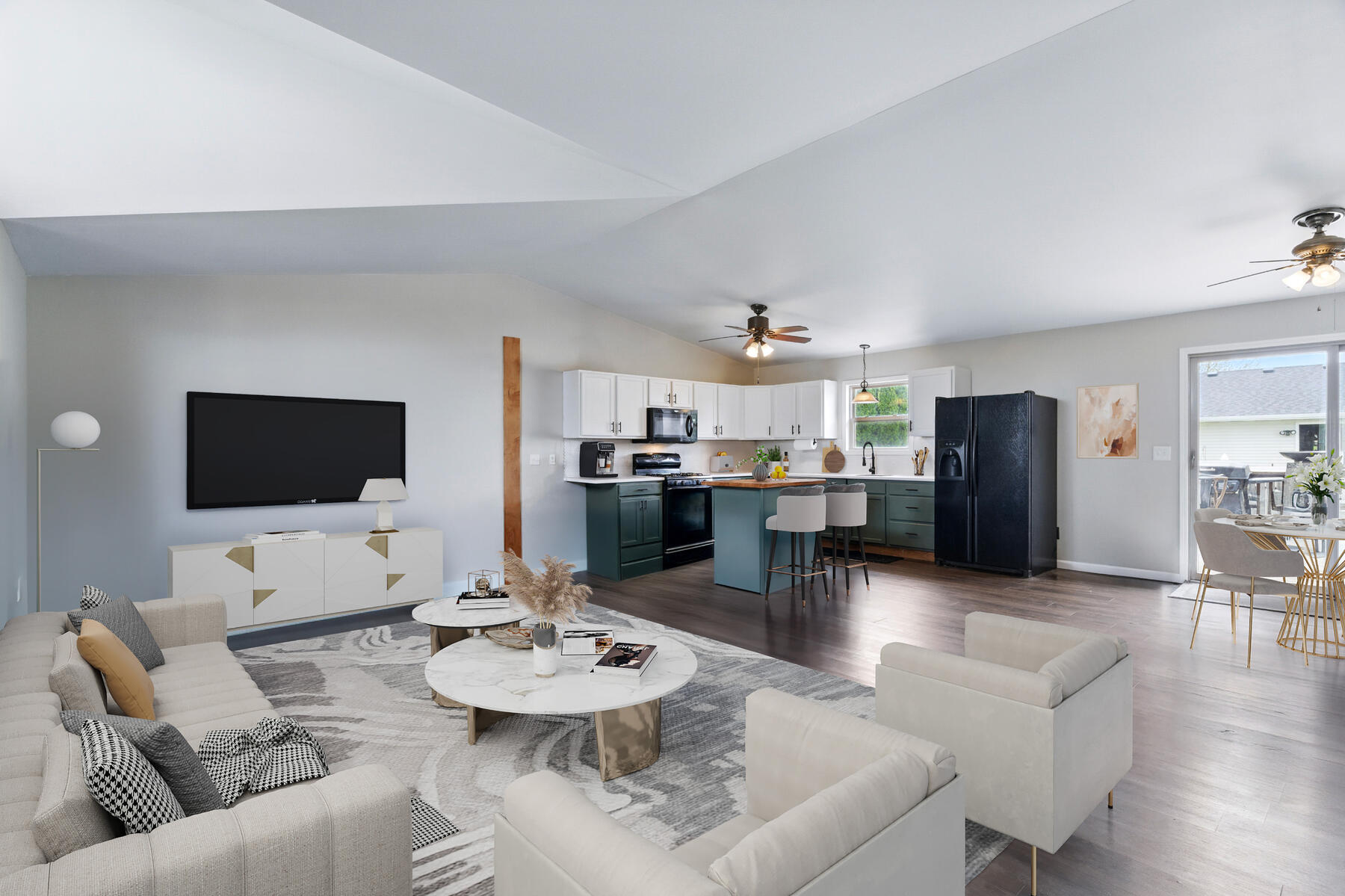 VIRTUAL STAGING Vacant living room virtually staged with sofa, rug, and wall art